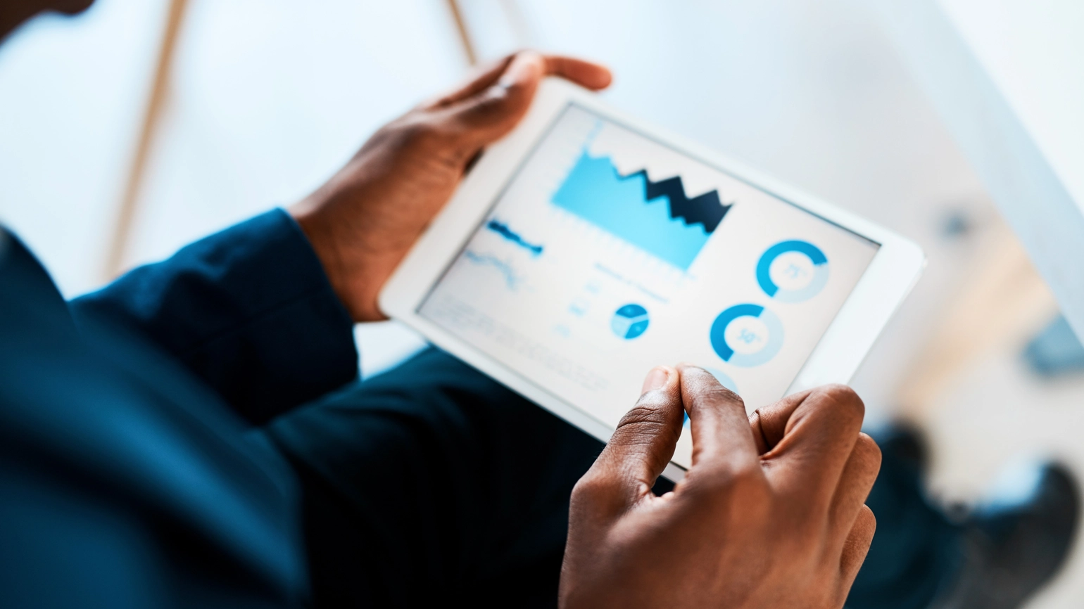Hand checking stocks and numbers in touch screen Hand checking stocks and numbers in touch screen