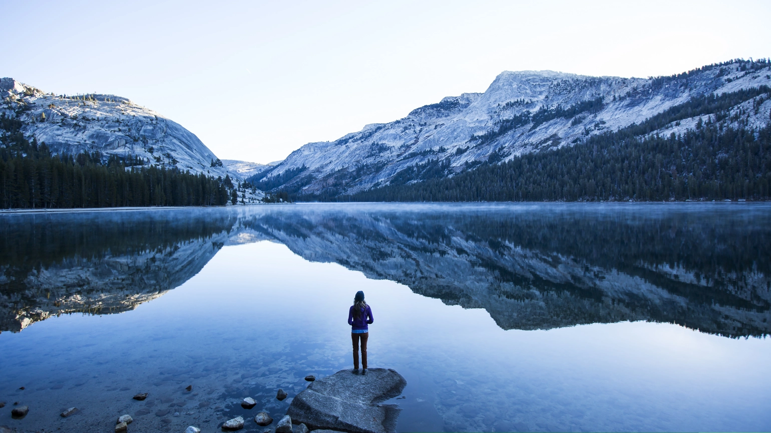 Photo of female looking at the Mountain and Lake in California, United States Photo of female looking at the Mountain and Lake in California, United States