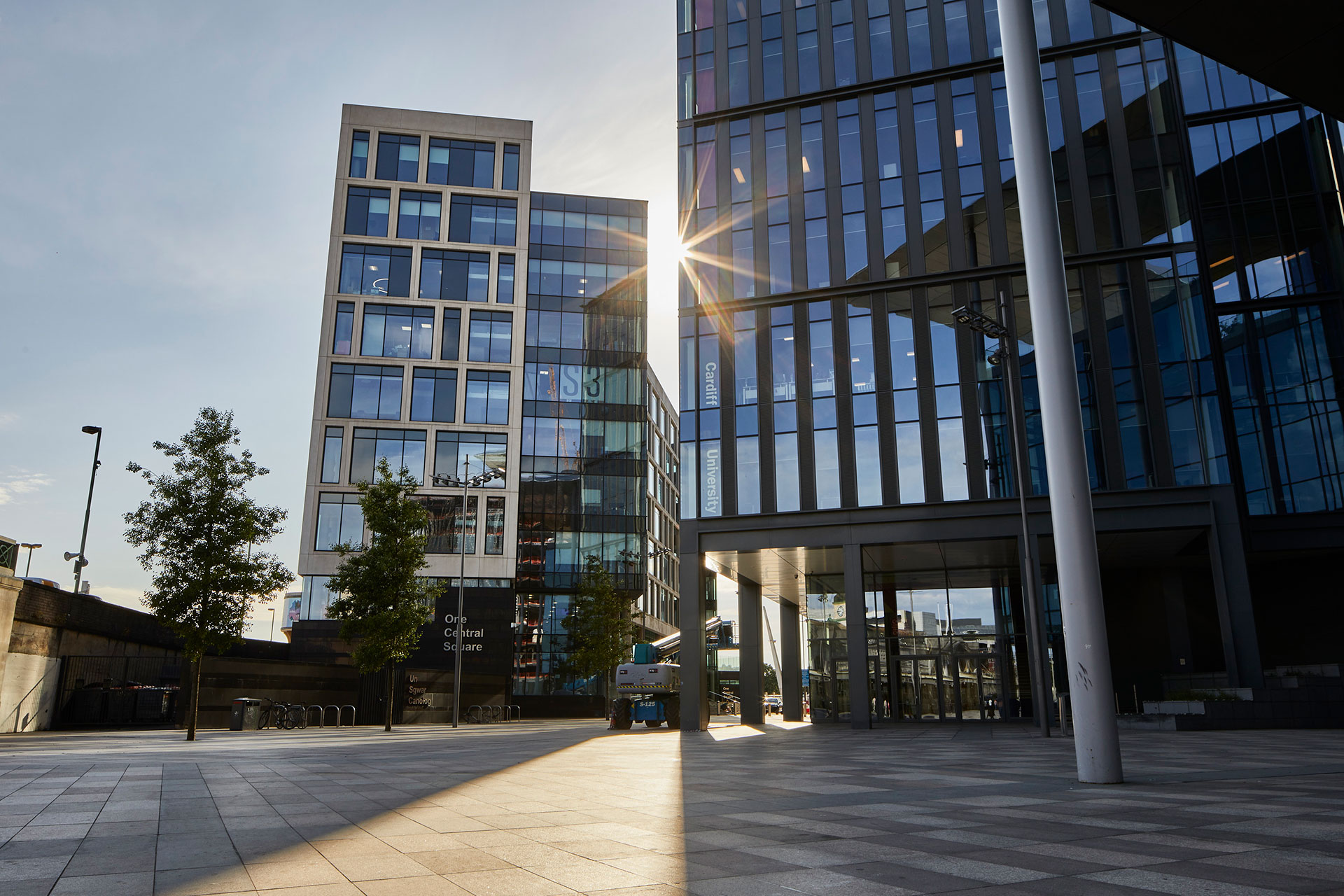 A red crane above a residential building 