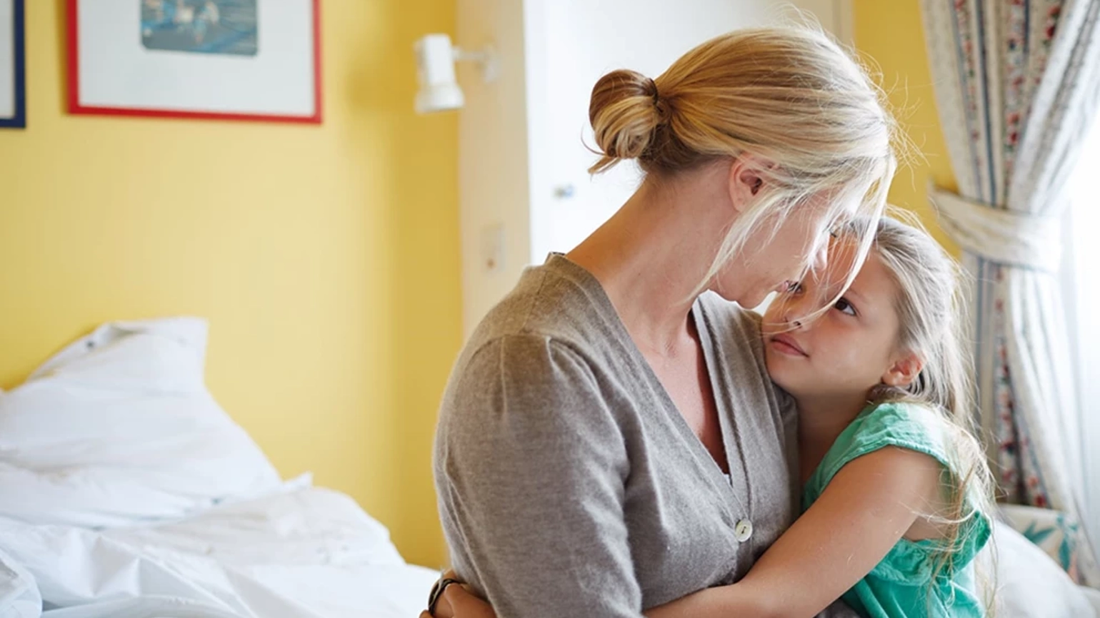 Mother holding her daughter Mother holding her daughter