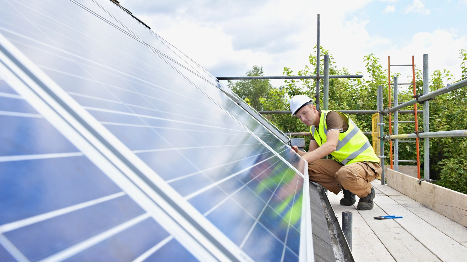 Engineer checking solar panel Engineer checking solar panel