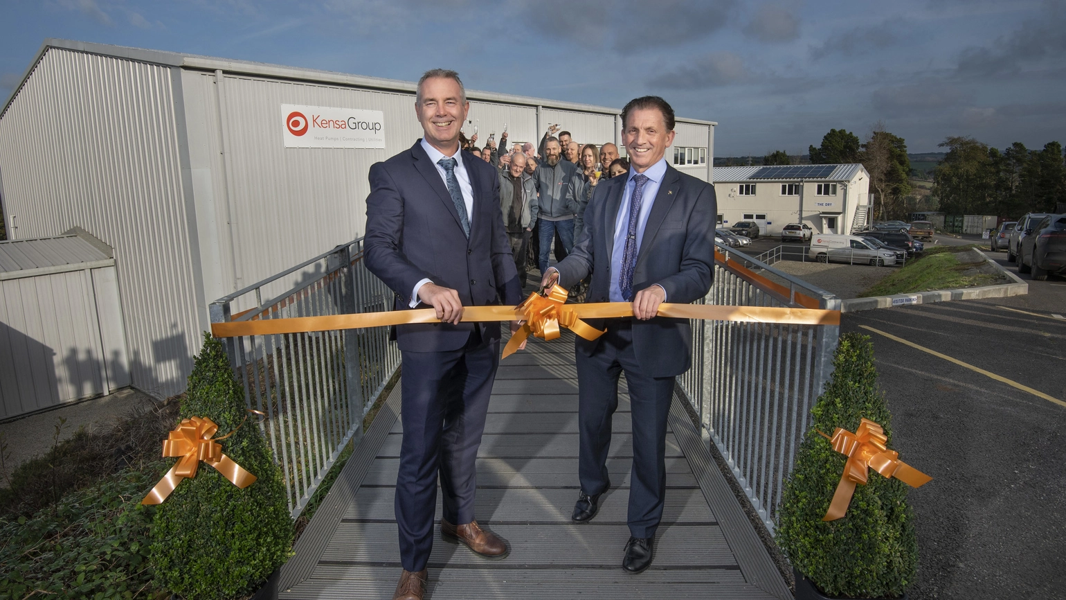 Sir Nigel Wilson, CEO of Legal & General, and Dr Matt Trewhella, CEO of The Kensa Group, cut the ribbon at the official opening of The Kensa Group’s factory in Truro, Cornwall Sir Nigel Wilson, CEO of Legal & General, and Dr Matt Trewhella, CEO of The Kensa Group, cut the ribbon at the official opening of The Kensa Group’s factory in Truro, Cornwall