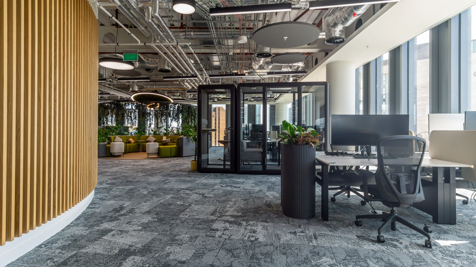 Phone booths and desks inside Legal & General's Wales office, named Calon, located in Cardiff Central Square. Phone booths and desks inside Legal & General's Wales office, named Calon, located in Cardiff Central Square.