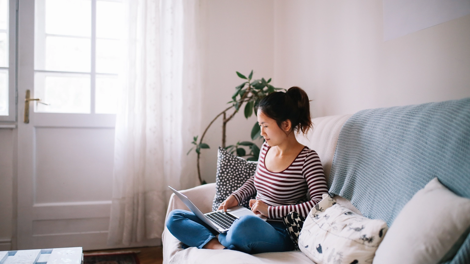 Womanonsofawithlaptop Womanonsofawithlaptop